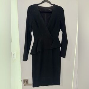 Elegant Black Halo Peplum Dress